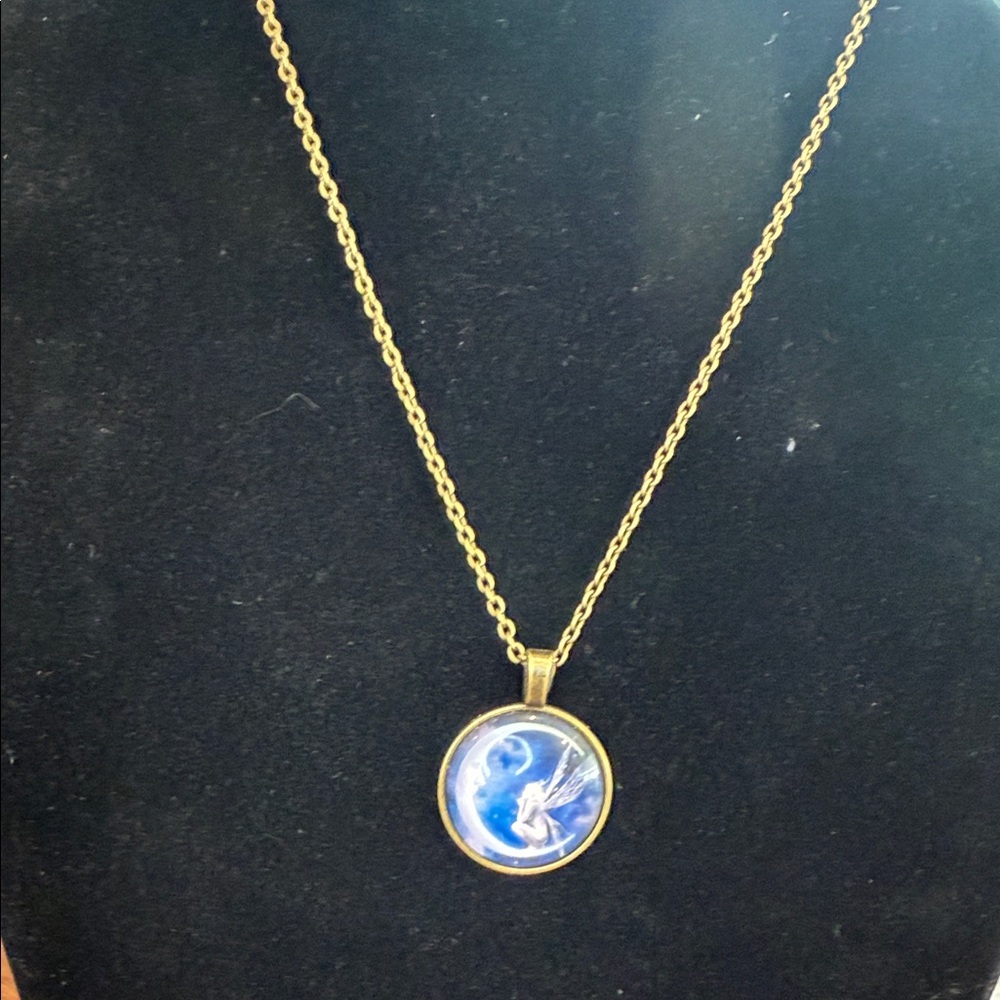 Elegant Gold and Blue Pendant Necklace with Fairy